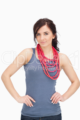 Young woman with a red bead necklace
