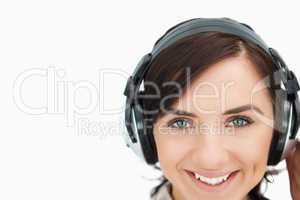 Woman with beautiful eyes wearing headphones
