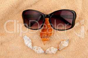 Shellfishes and sunglasses representing a face