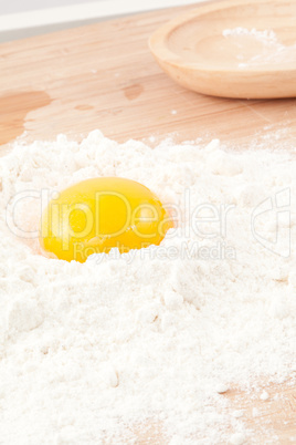 Egg yolk on the flour