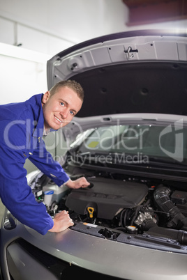 Mechanic looking at camera