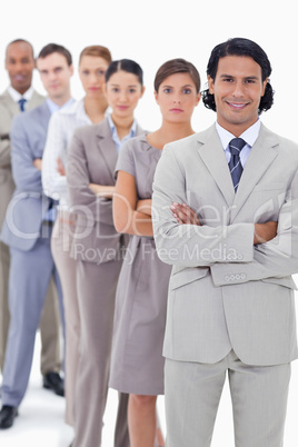 Close-up of a business team crossing their arms in a single line