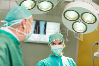 Surgeons looking at each other