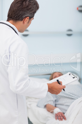 Doctor looking at his patient