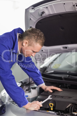 Mechanic holding a spanner