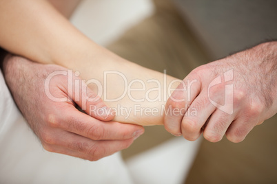 Foot being stretched by a physiotherapist