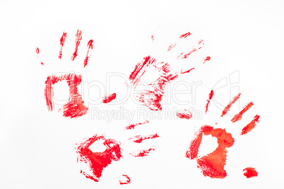 Four red handprints