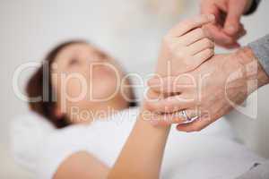Hand of a woman being manipulated
