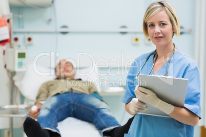 Nurse next to a male patient