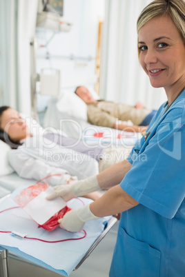Nurse holding a blood bag