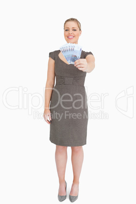 Woman showing euros banknotes