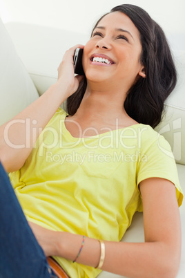 Laughing Latino on the phone