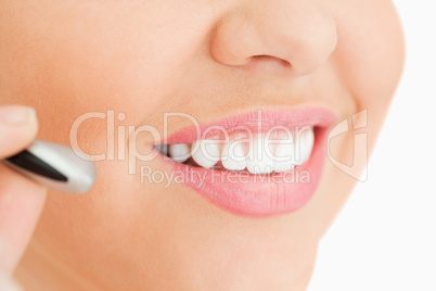 Close-up of a woman working in a call center