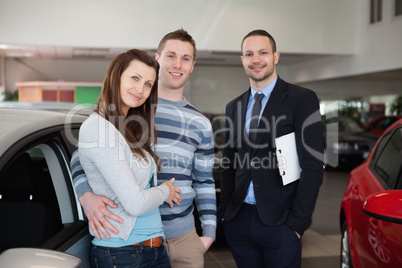 Couple purchasing a car