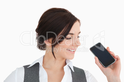 Young businesswoman looking her smartphone