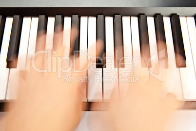 Someone playing piano