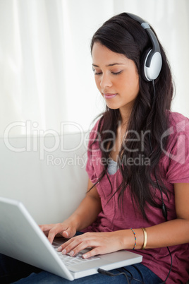 Close-up of a Latino student using a laptop