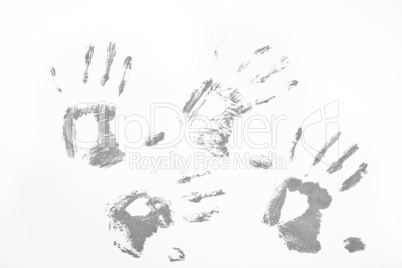 Four grey handprints