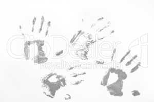 Four grey handprints