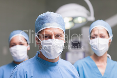 Medical team looking at camera