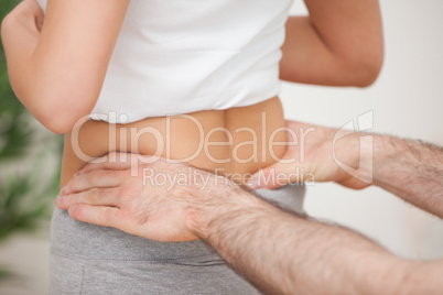 Close-up of a man touching the hips of a woman