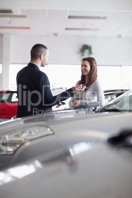 Salesman speaking with a woman