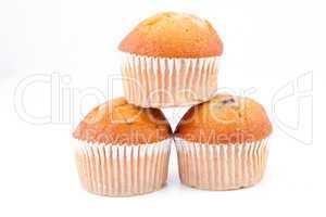 Three muffins piled up