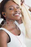 Close up of a black woman drying with a towel