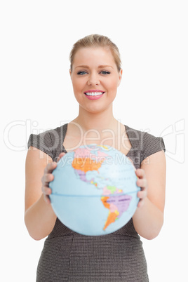 Woman holding a globe