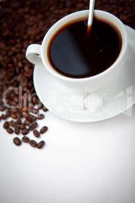 Black coffee with beans