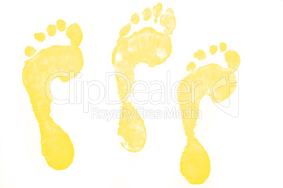 Three yellow footprints