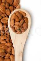 Wooden spoon with almonds