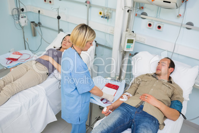 Nurse looking after a transfused patient