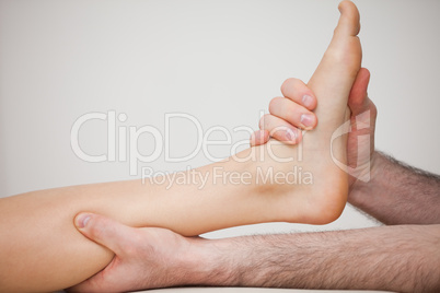 Foot being held by a doctor