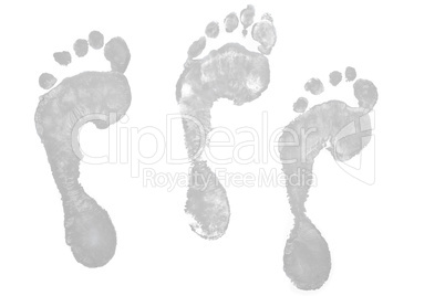 Three grey footprints
