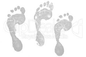 Three grey footprints