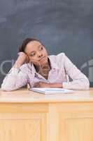 Close up of a thoughtful black woman on desk