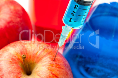 Syringe with apples