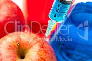 Syringe with apples