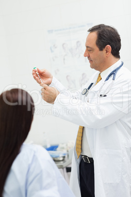 Doctor preparing an injection