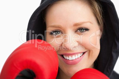Woman smiling boxing