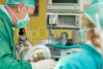 Surgeon working on a patient