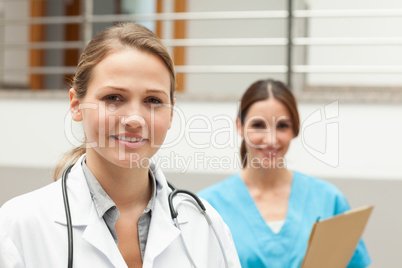 Nurse and a doctor standing