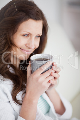 Woman holding a mug of coffee