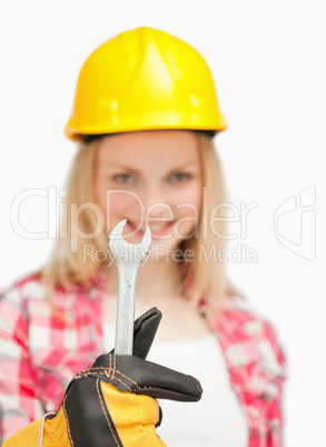 Woman holding a wrench