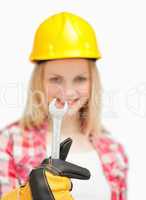 Woman holding a wrench