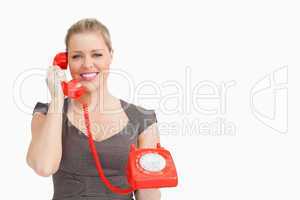 Woman listening someone at a phone