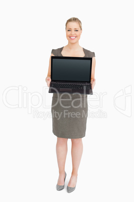 Woman showing a laptop