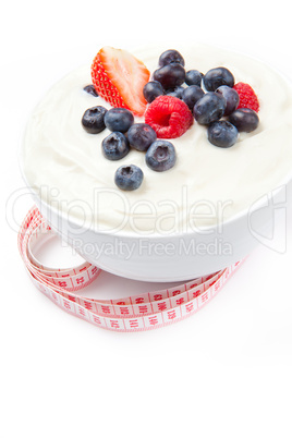 Berries cream with a tape measure