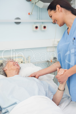 Nurse and a patient smiling